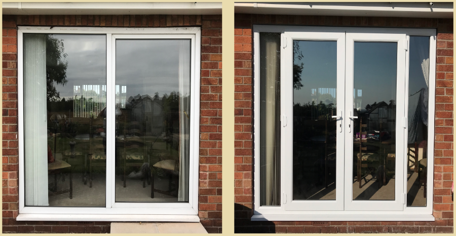Modern white French doors with garden view.